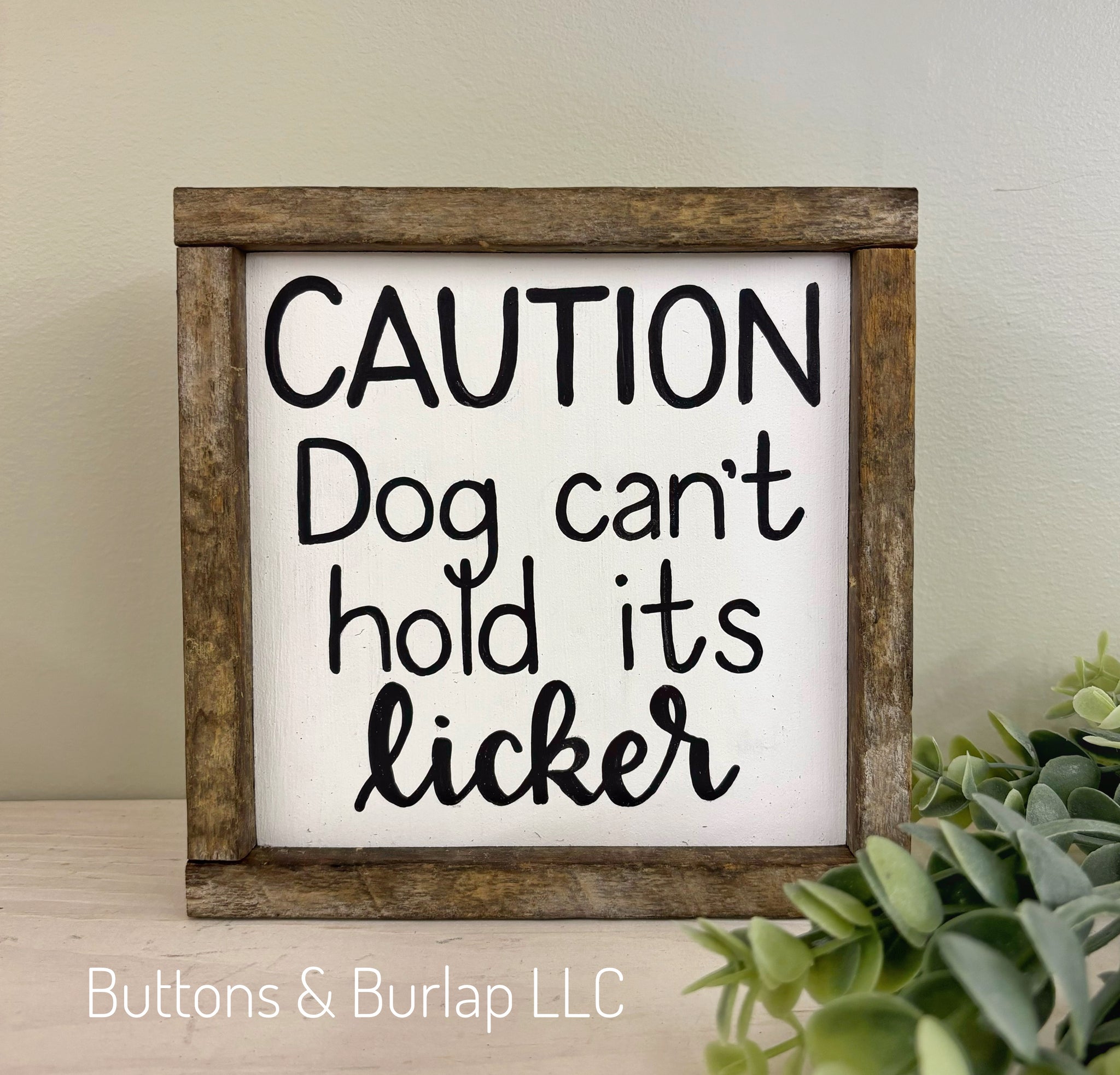 CAUTION Dog can’t hold its licker