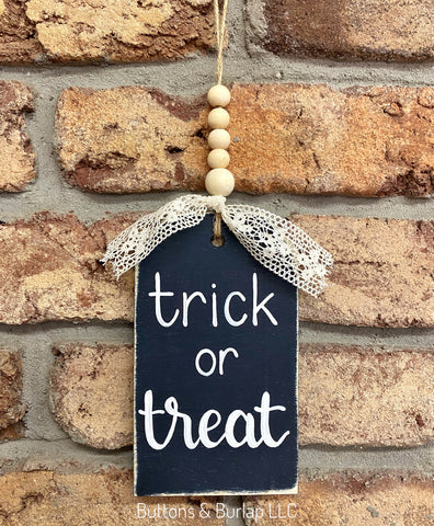 Trick or treat beaded wood tag