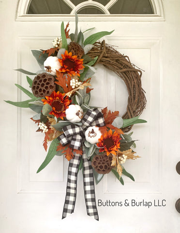 Orange sunflowers & lotus pods fall wreath