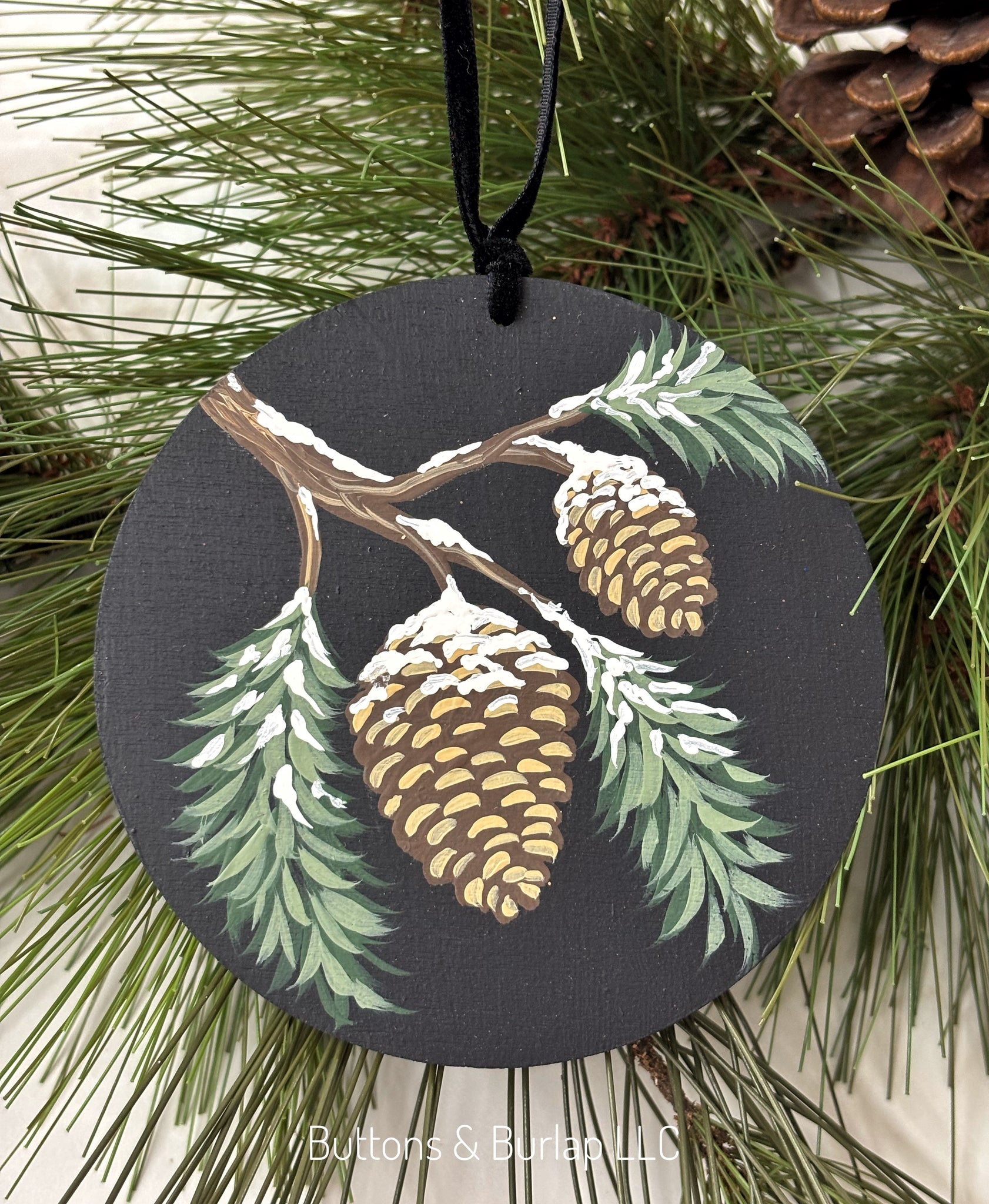 Snowy pinecones ornament