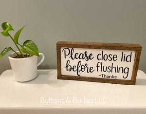 Please close lid before flushing, toilet sign