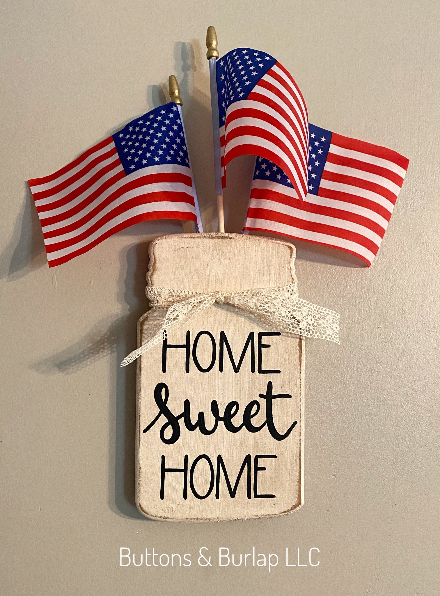 Home sweet home sign with removable flags