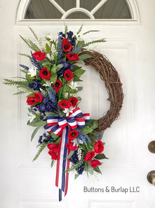 Patriotic wreath, red poppies, red white and blue bow