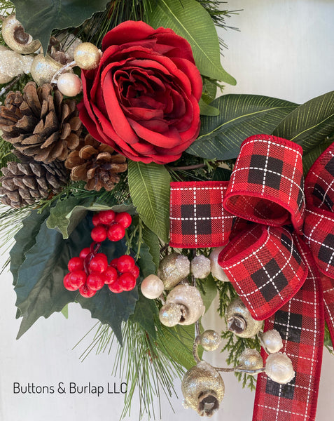 Christmas wreath, glittered berries, red roses